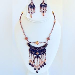 Peach/pink bohemian necklace set.$45